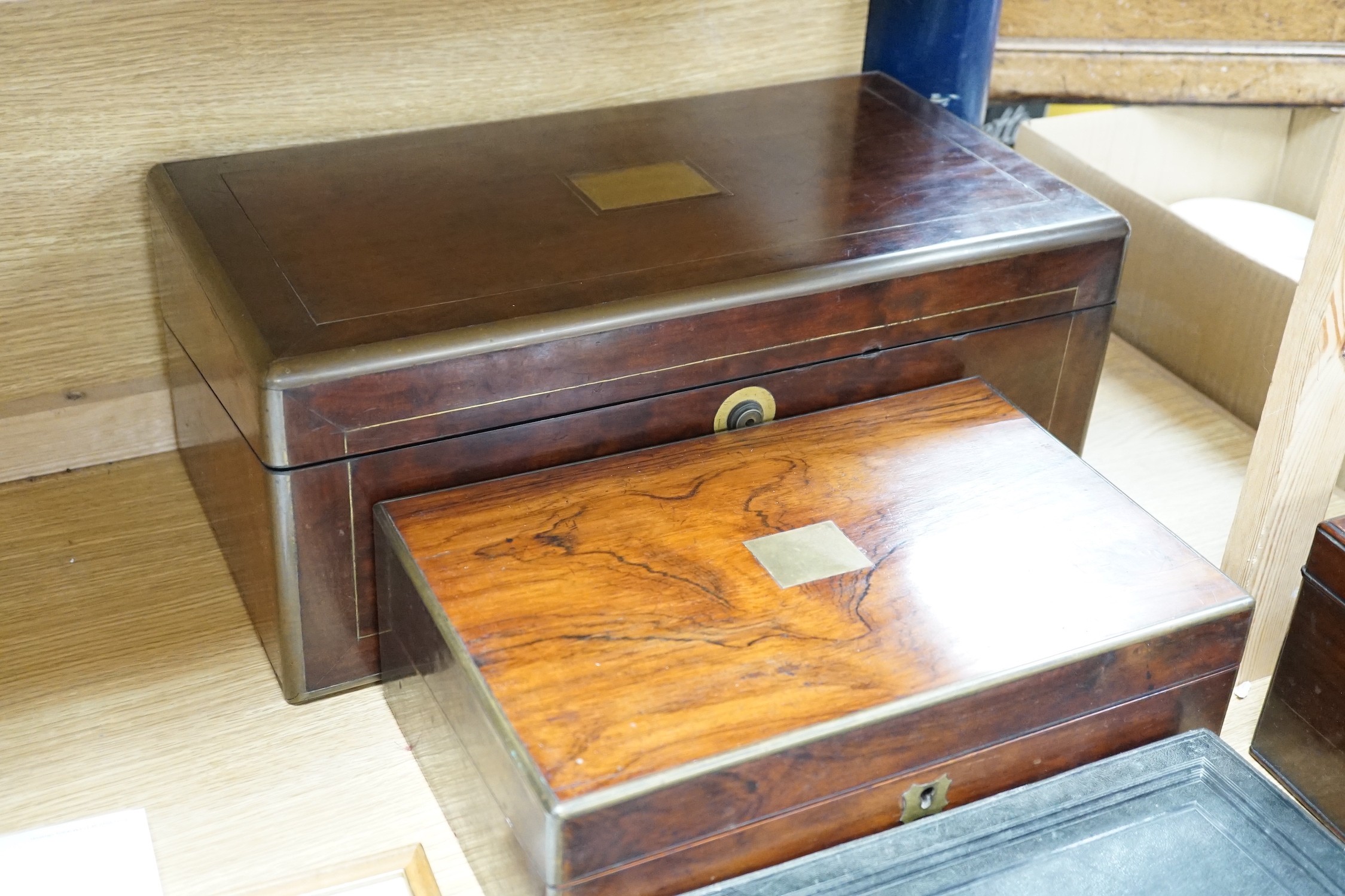 A Georgian three divisional tea caddy together with two writing slopes, largest writing slope 50cms wide x 20cm high, and a box containing cutlery